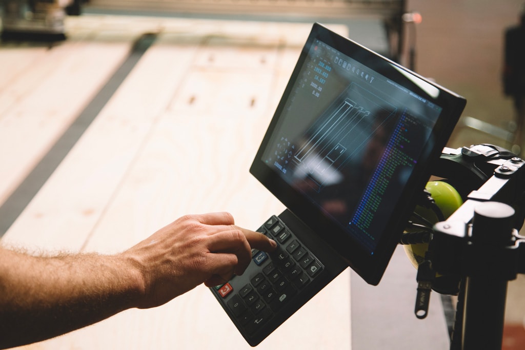 a user moving the machine thanks to the keypad and the expandable touch interface