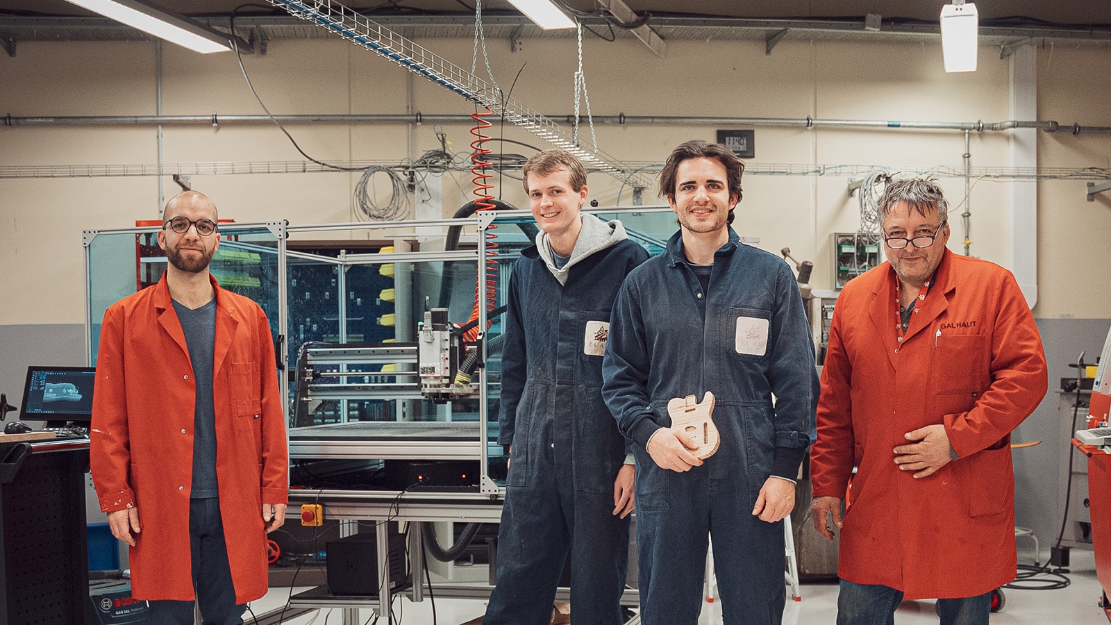 Students and Teachers at ECAM University Brussels with a Mekanika CNC machine in the background