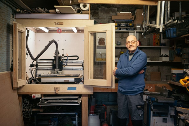 User in his workshop standing next to his Mekanika Pro