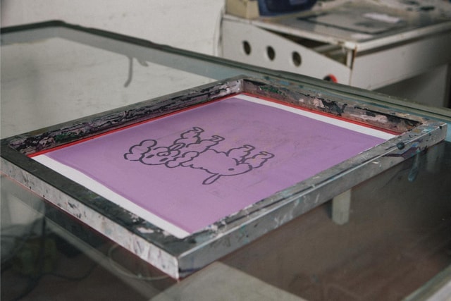 Screen printing frame with a dog drawing ready to print