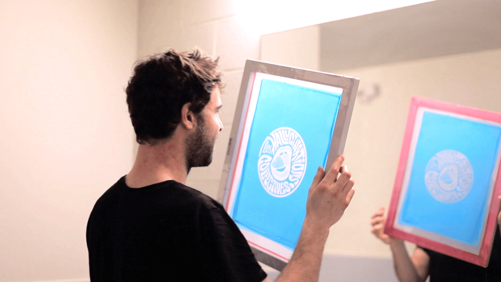 screen printing exposing a screen with a drawing checking for imperfections