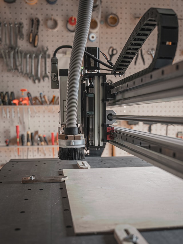 Mekanika Pro CNC milling machine side close up picture with hand tools in the background