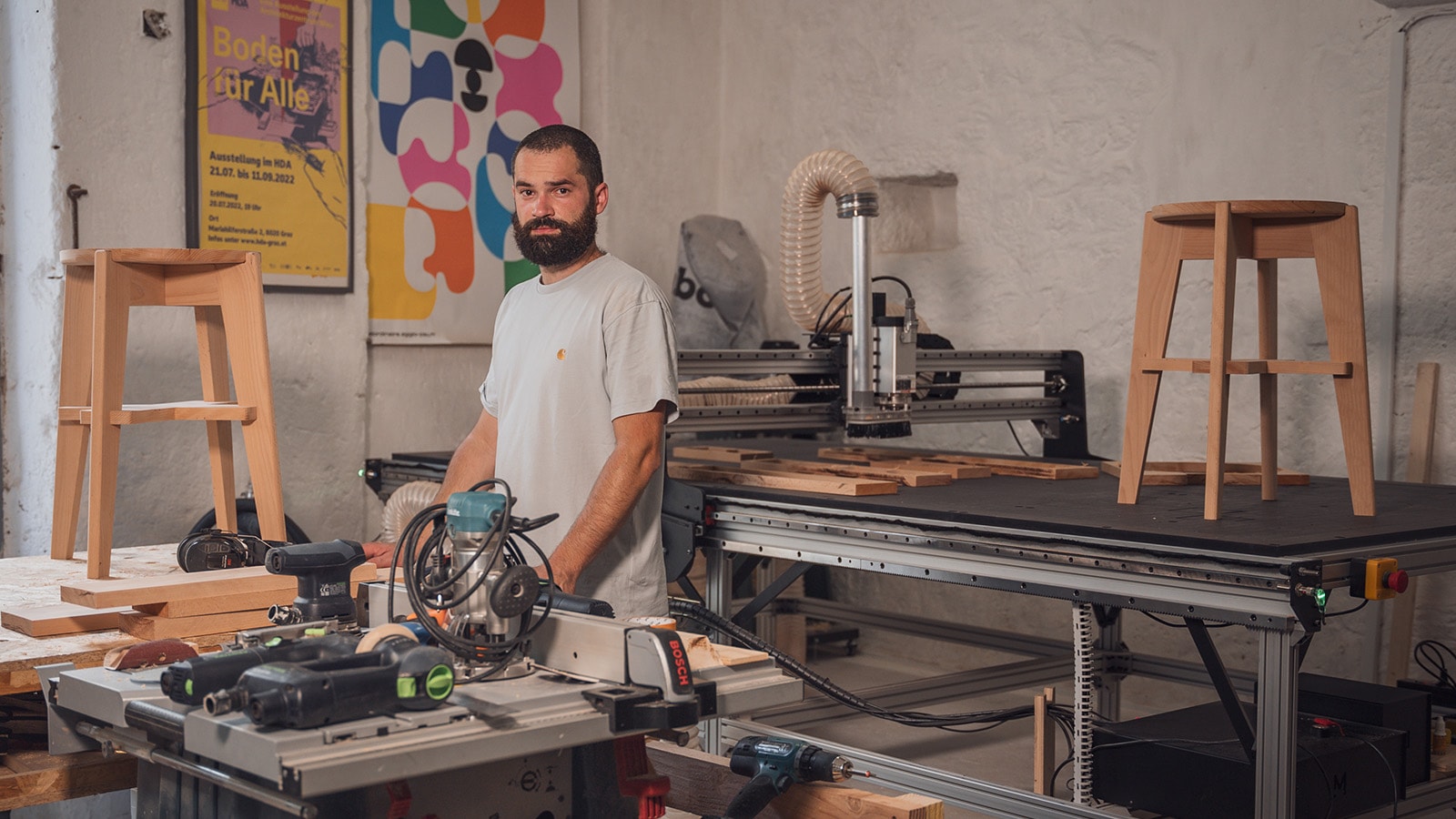Haddock menuiserie in his woodworking workshop with a full panel cnc machine Mekanika Fab in the background