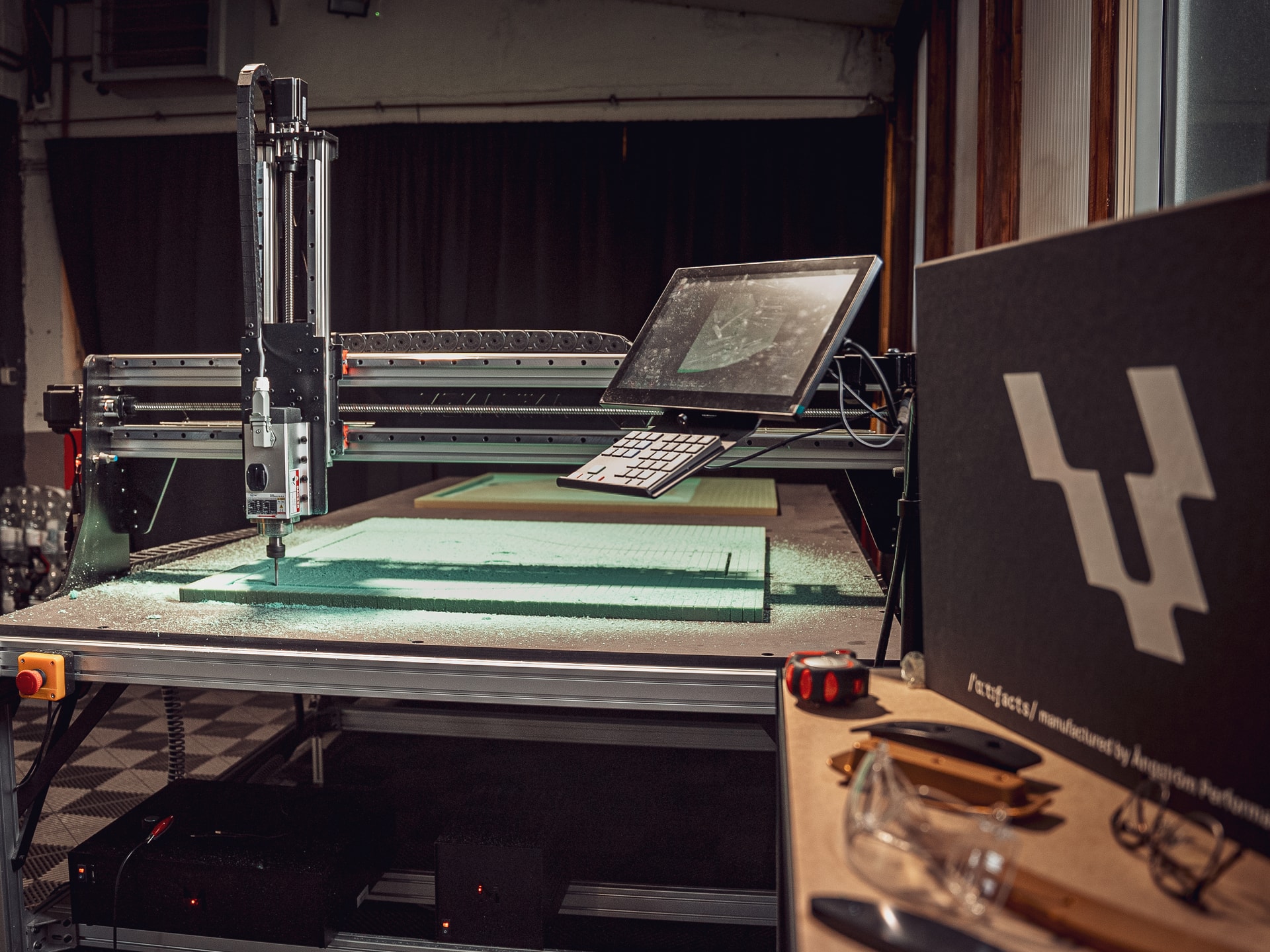 Mekanika Fab CNC milling machine view while milling green foam material to make a mold for carbon fiber car parts