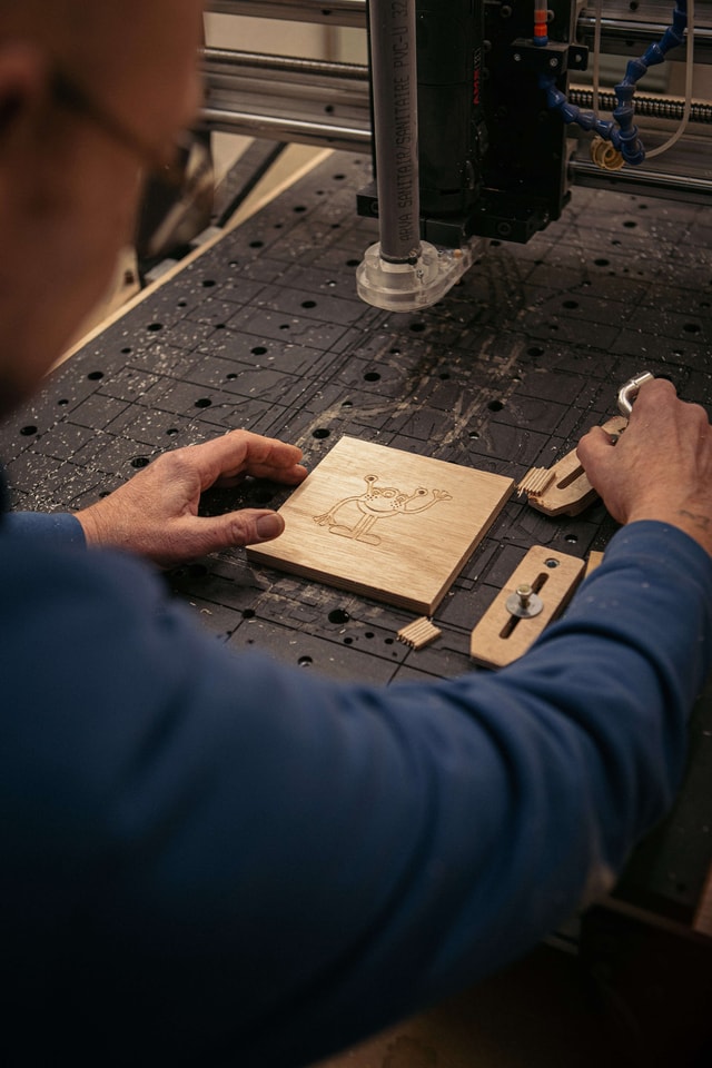 User working on a cartoon engraving
