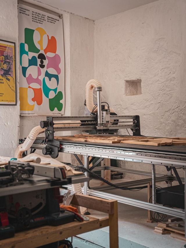 The mekanika Fab in Haddock's workshop milling some wood