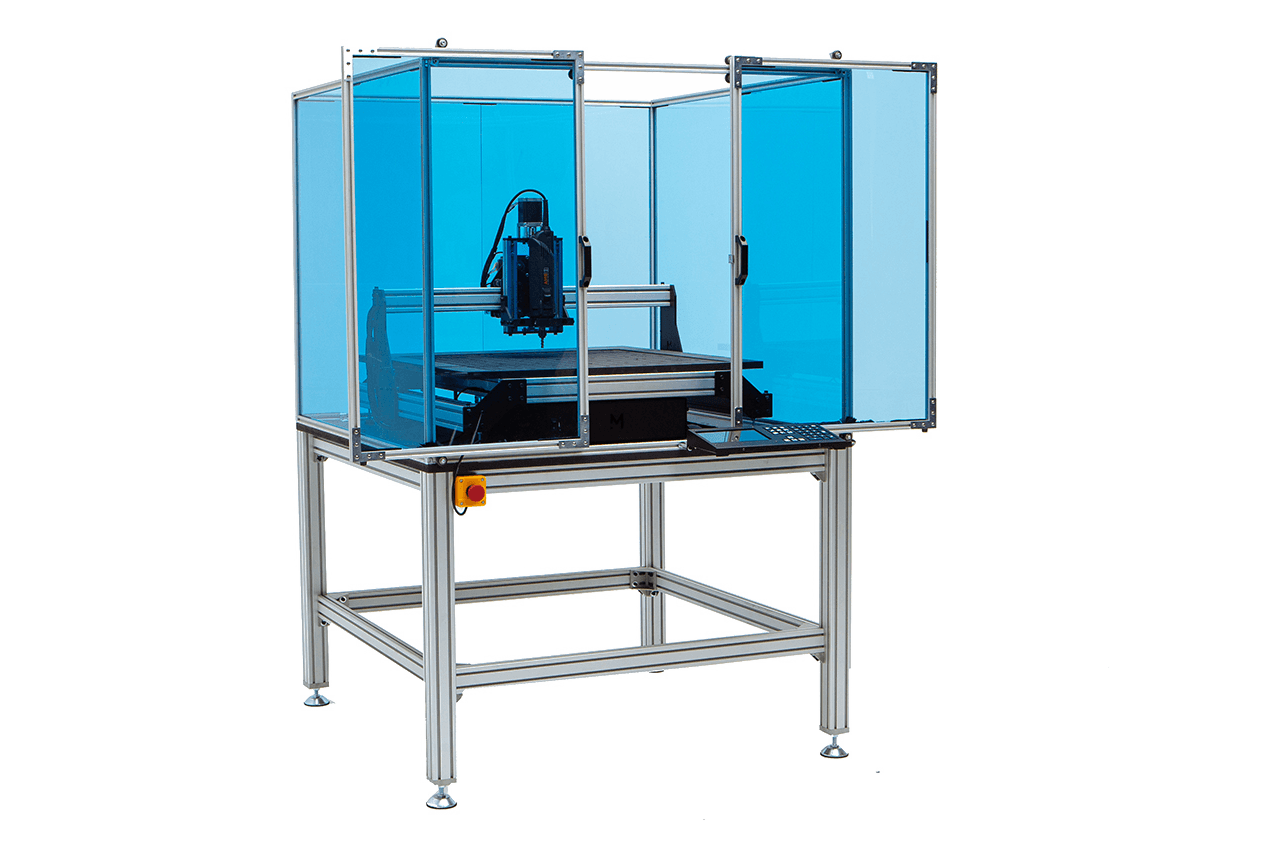 The Mekanika Evo Education Bundle composed with Evo milling machine, a worktable, and a safety enclosure